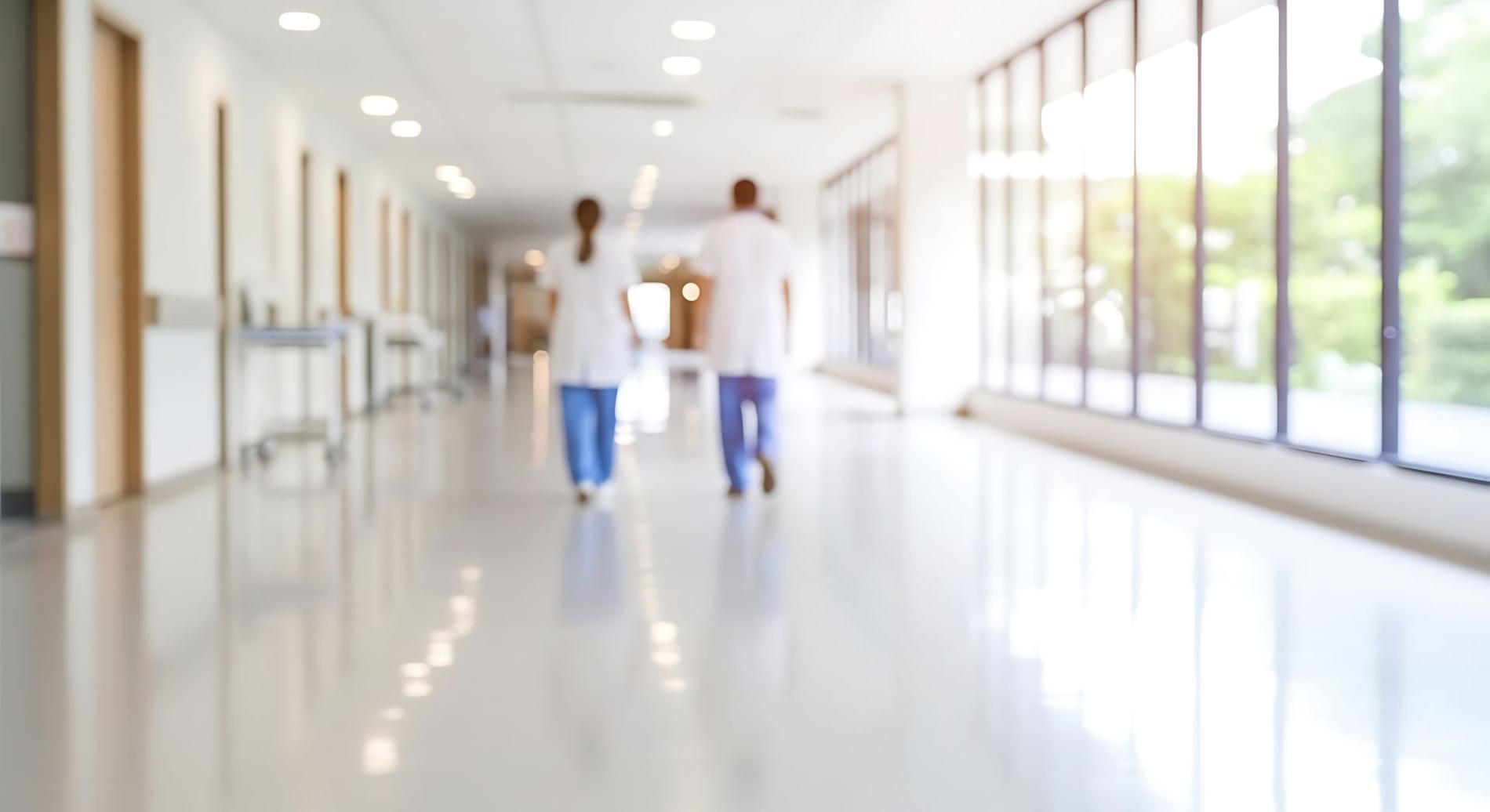 Zorgverleners in een zorginstelling, illustratie bij een artikel over de hervorming van de ziekenfondsen en de Belgische gezondheidszorg.